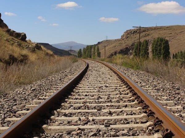 free-photo-of-serene-railway-track-in-scenic-mountain-landscape