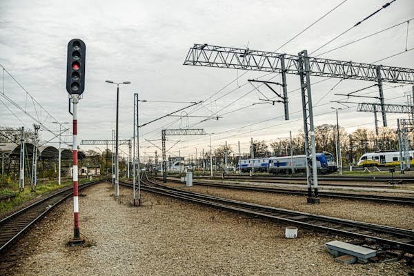 free-photo-of-sleek-modern-train-station-with-tracks-and-signals